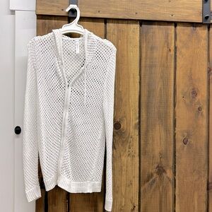 Cute Fabletics “fish net” jacket. Great as a coverup over a swimsuit or to yoga.